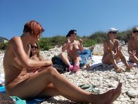 Nudist amateurs at beach and yacht