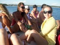 Nudist amateurs at beach and yacht