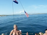 Nudist amateurs at beach and yacht