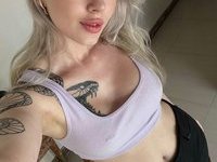 Blonde with juicy pussy and pierced tits