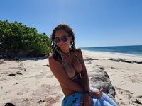 Busty amateur wife posing naked at beach