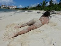 Busty amateur wife posing naked at beach