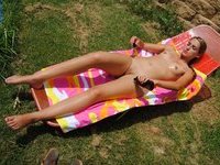 Dalila sunbathing naked