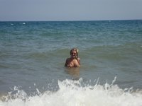 Rita teasing at beach