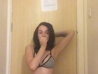 Amateur brunette posing naked on cam