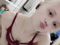 Blonde teen cutie showing her naked body