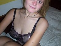 Amateur blonde wife posing on bed