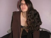 Amateur brunette girl nude posing on bed