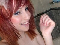 Redneaded teen babe at shower