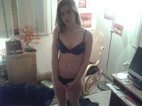 Coed amateur girl posing at hostel