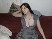 German brunette GF posing naked on bed