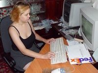 Horny girl near computer