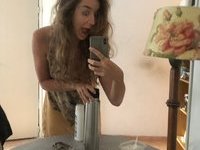 Amateur wife making nude selfies at home