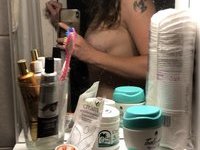 Amateur wife making nude selfies at home