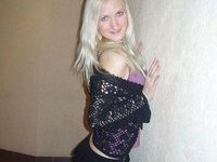 Blond wife posing for hubby