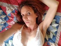 Sexy redhead MILF nude posing pics collection