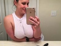 Amateur MILF likes to show off her big tits and massive ass