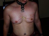 Torturing her hard nipples