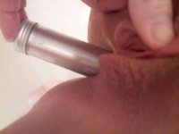 Dildo up her shaved pussy
