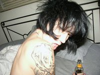Emo tattooed girl partying