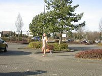Posing naked in a public place