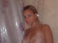 Naked chicks taking a shower