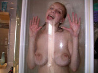 Wet nude babe in the shower