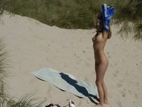 Blonde amateur babe naked at beach