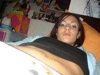 Young amateur babe teasing in her room