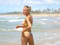 Blonde MILF posing at beach