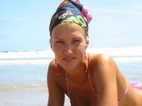 Blonde MILF posing at beach