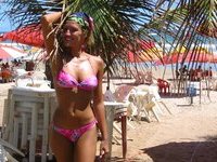 Blonde MILF posing at beach