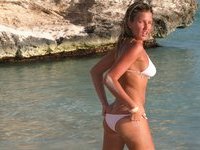 Blonde MILF posing at beach