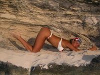 Blonde MILF posing at beach