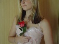 Blond amateur girl posing at home