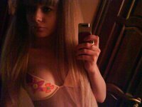Young blonde babe making selfies