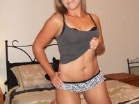 Pretty amateur babe posing at home