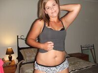 Pretty amateur babe posing at home