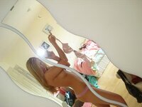 Selfies at mirror from charming blonde babe