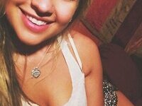 Smiley amateur teen babe showing her tits