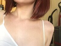 Nerdy but sexy redhead amateur girl