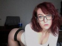 Redhead sexy amateur girl in glasses