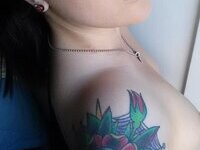 Tattooed amateur girl exposing herself