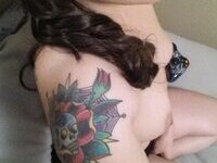 Tattooed amateur girl exposing herself