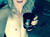 Pretty blond camwhore with small tits