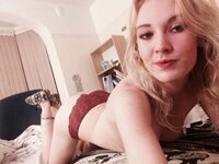 Pretty blond camwhore with small tits
