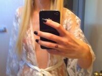 Seductive amateur blonde making hot self pics