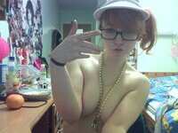 redhead amateur babe in glasses