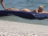 Nudist amateurs at summer vacation