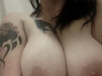 Busty tattooed amateur girl love posing on cam